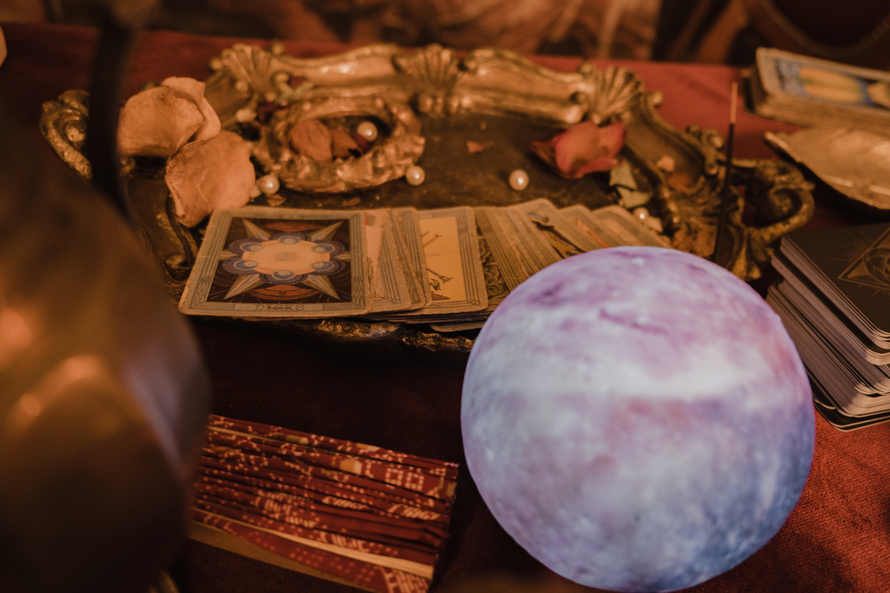 Crystal Ball and Tarot Cards on Table for Fortune Telling